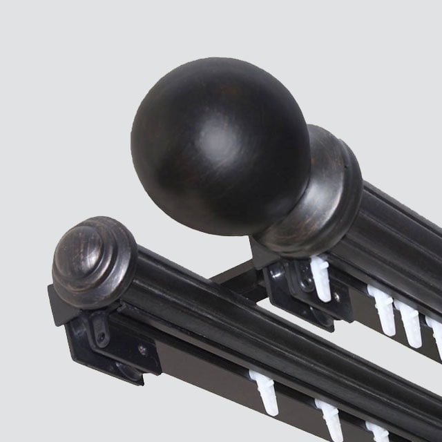 Combination rod with stationary rod in front and traverse rod in back