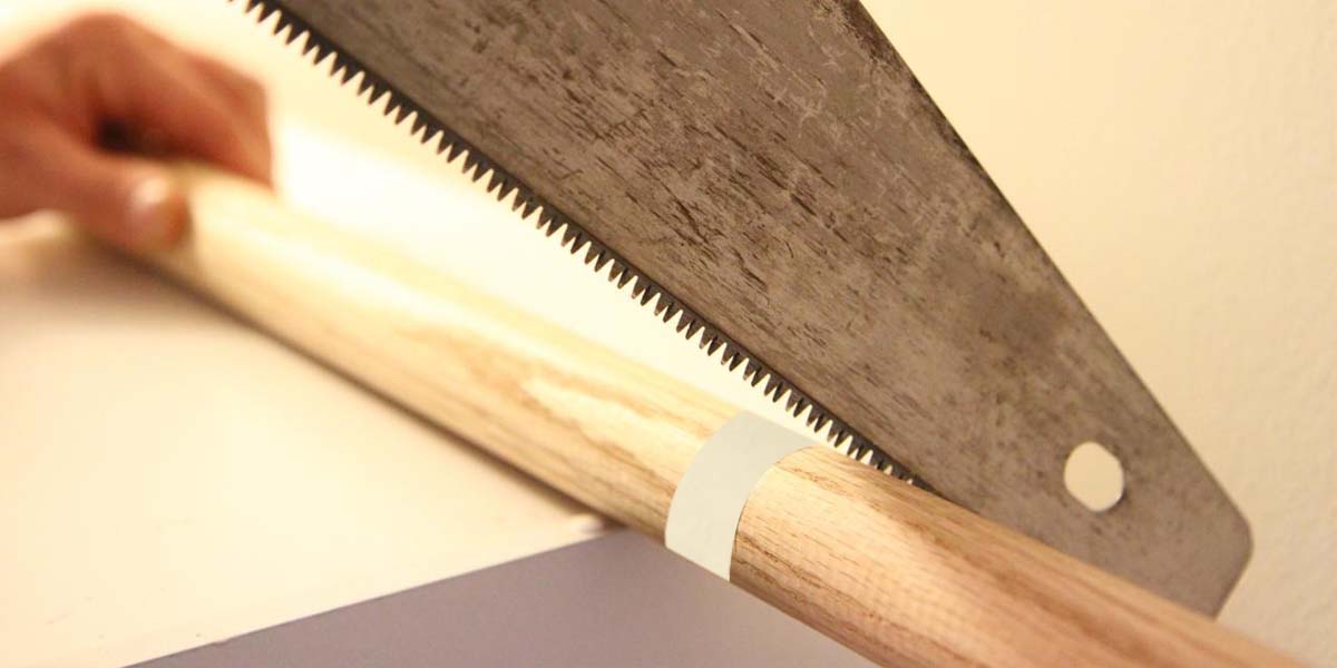 Sawing a wooden curtain rod
